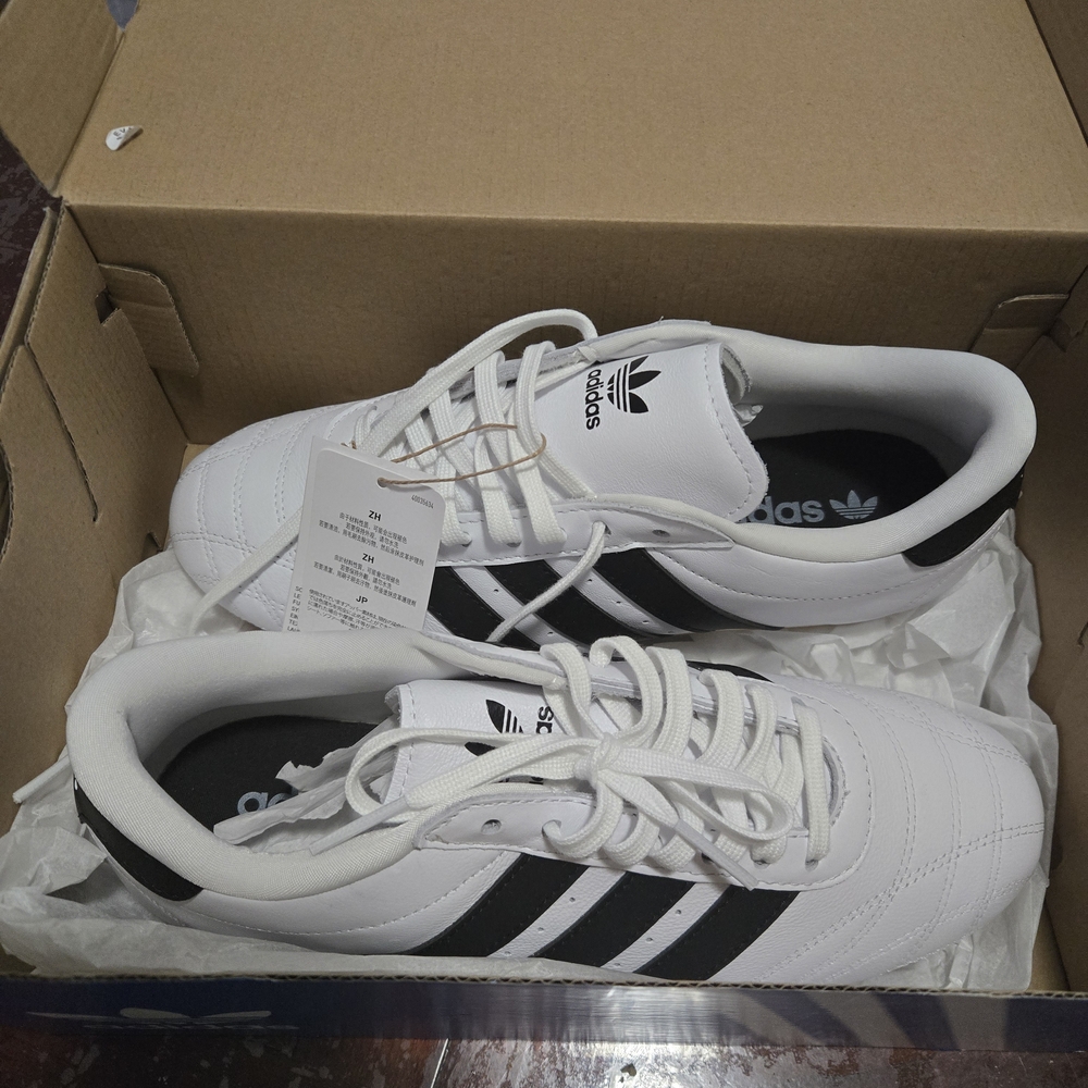 Adidas Men's White and Black Striped Sneakers